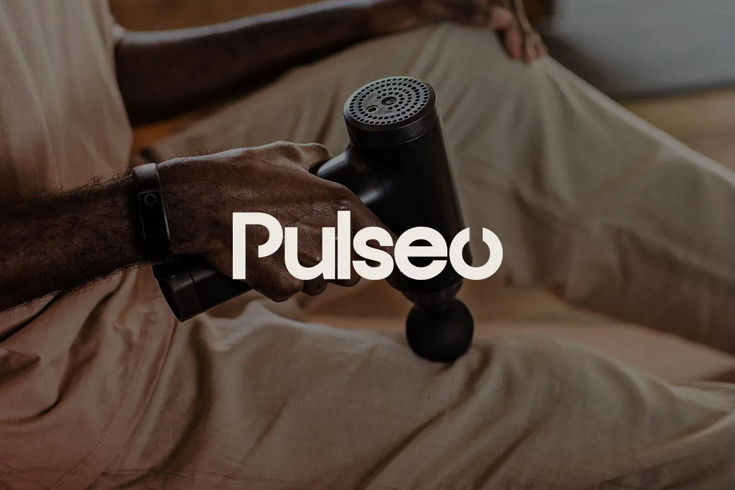 Pulseo: the Pulseo wordmark over a hand holding a massage gun
