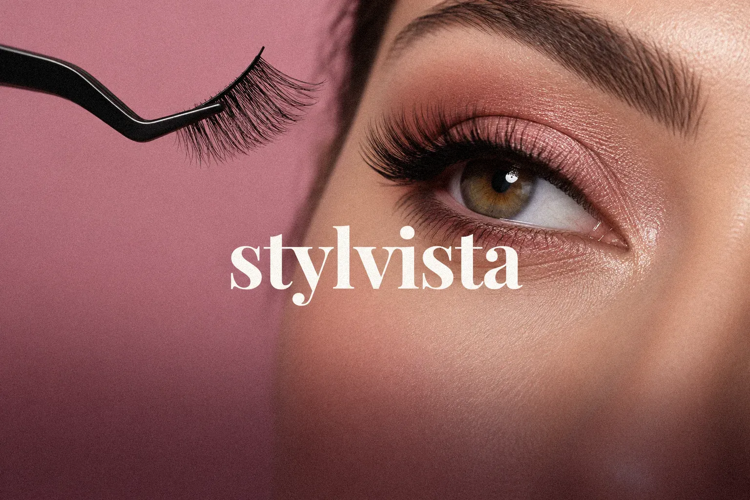 Stylvista: the Stylvista wordmark beside a close-up of an eye with lash extensions